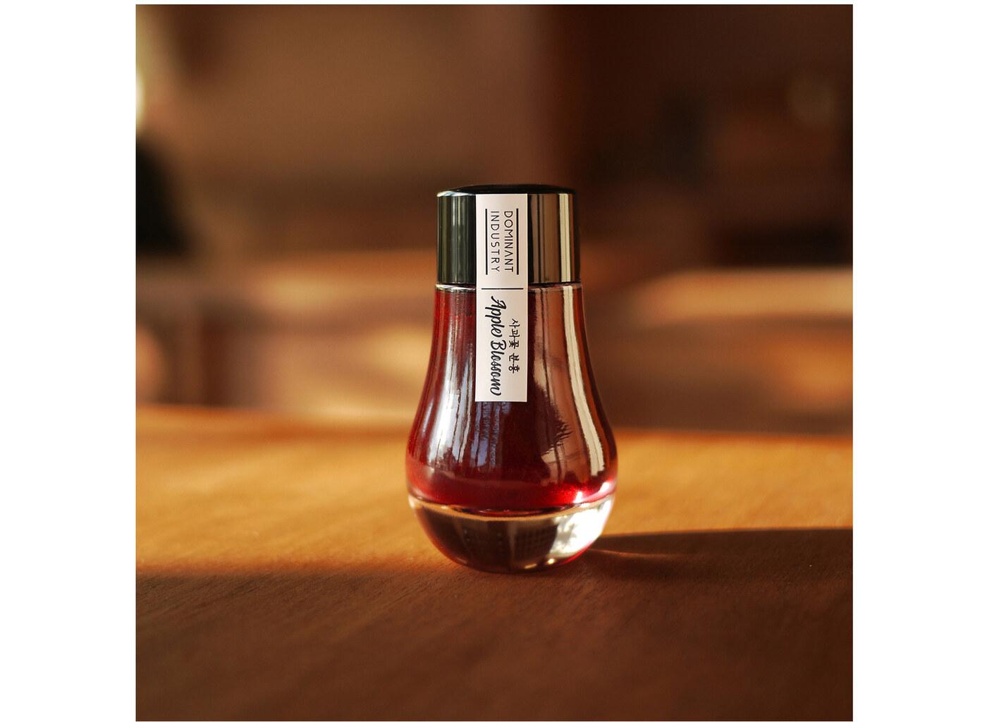 A bottle of Dominant Industry Pearl 005 Apple Blossom.