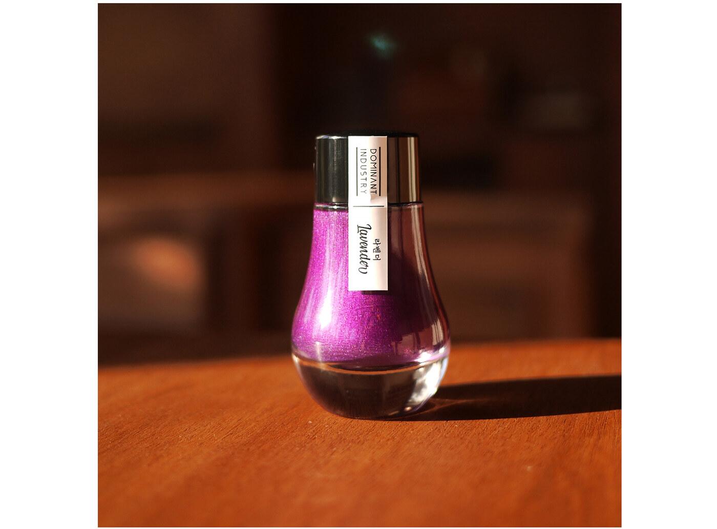 A bottle of Dominant Industry Pearl 010 Lavender.