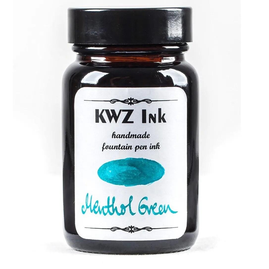 A bottle of KWZ Standard 4200 Menthol Green.