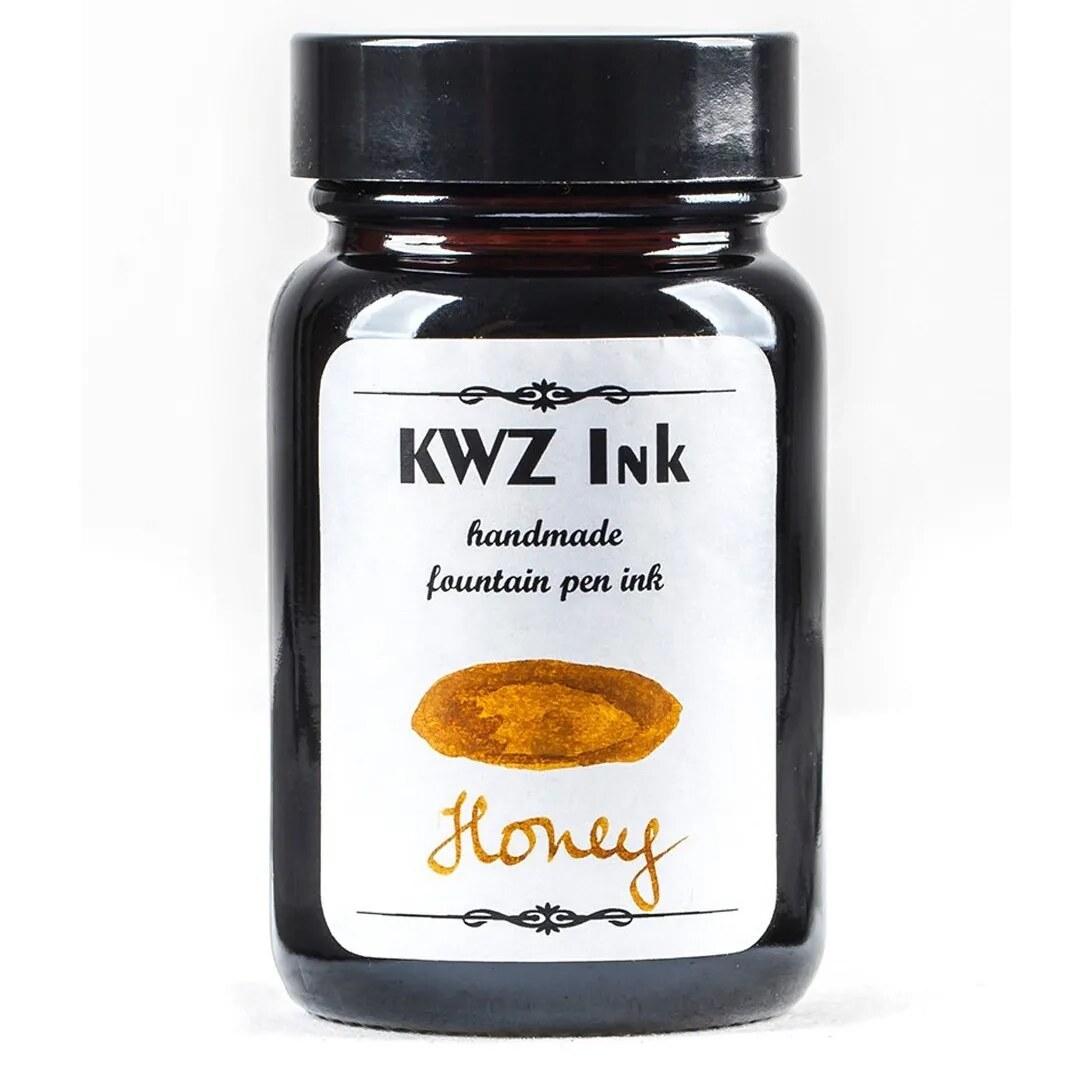 A bottle of KWZ Standard 4306 Honey.