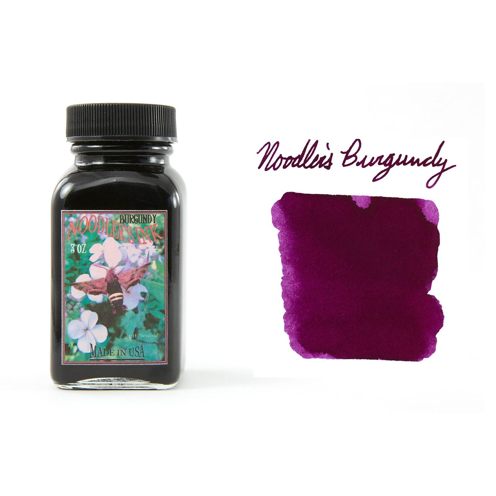 A bottle of Noodler's Burgundy beside its swatch.