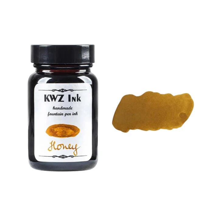 A bottle of KWZ Standard 4306 Honey beside its swatch.