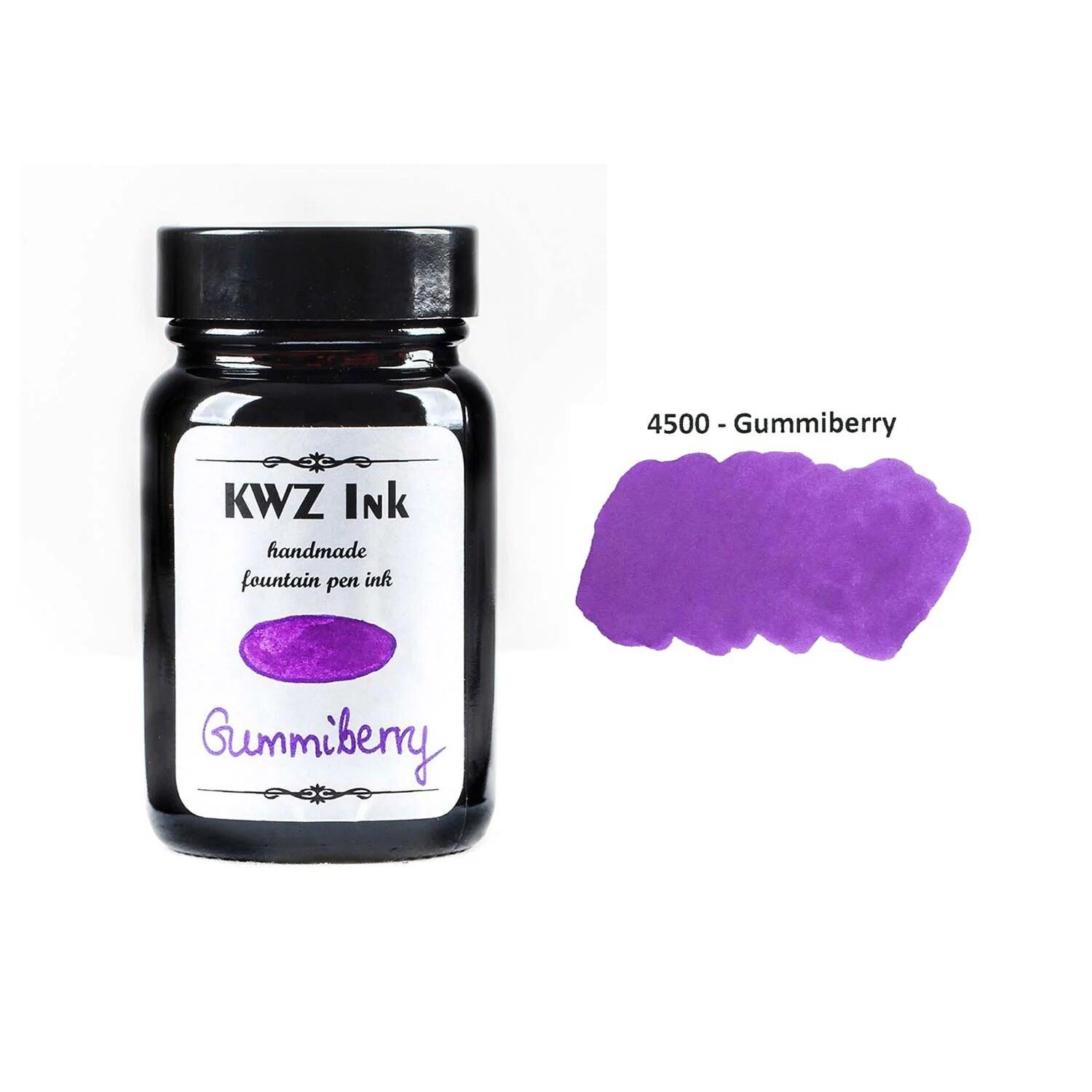 A bottle of KWZ Standard 4500 Gummiberry beside its swatch.