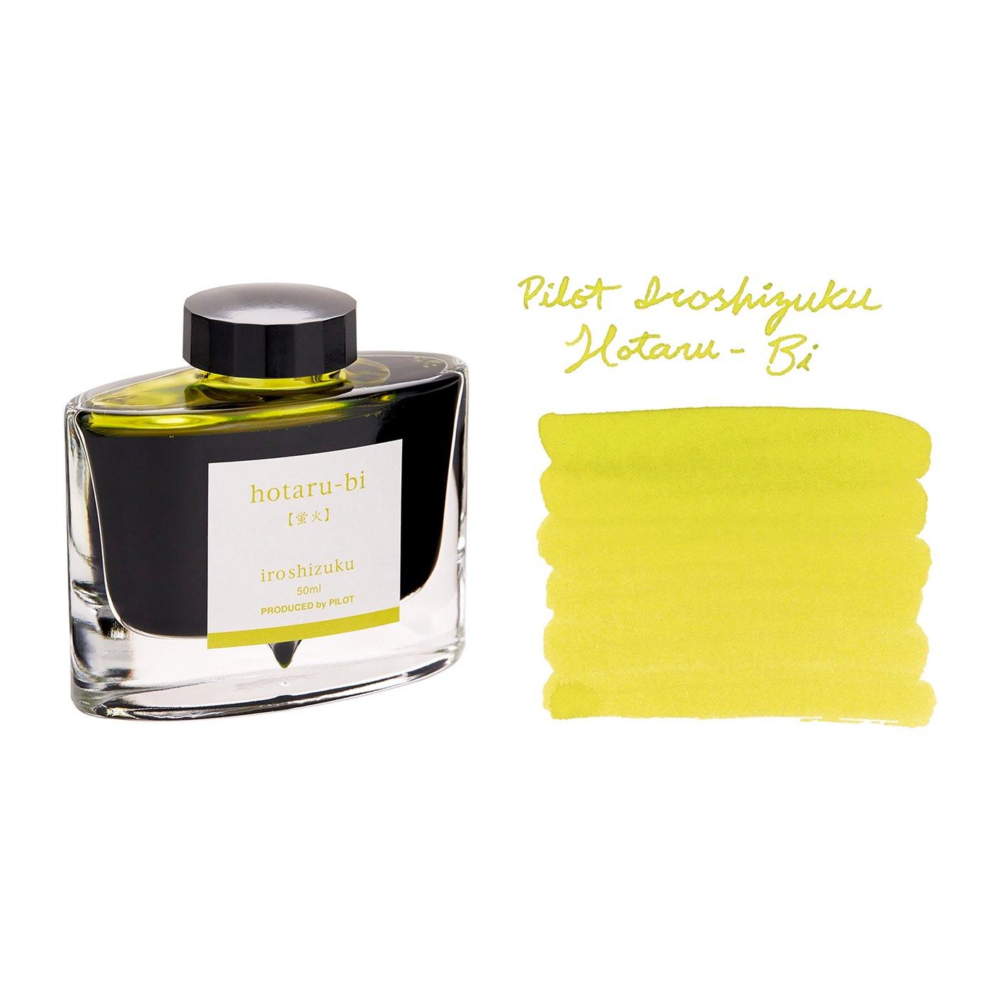 A bottle of Pilot Iroshizuku Hotaru-bi beside its swatch.