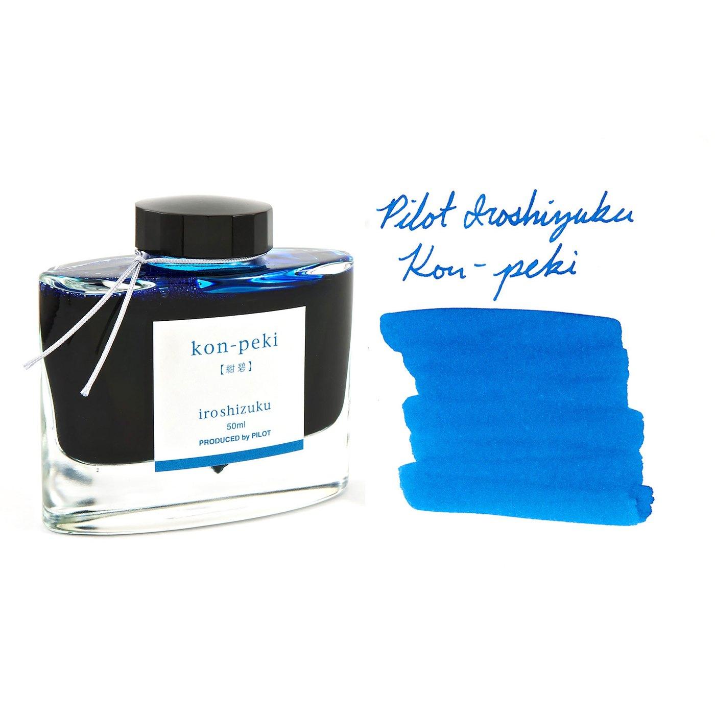 A bottle of Pilot Iroshizuku Kon-peki beside its swatch.